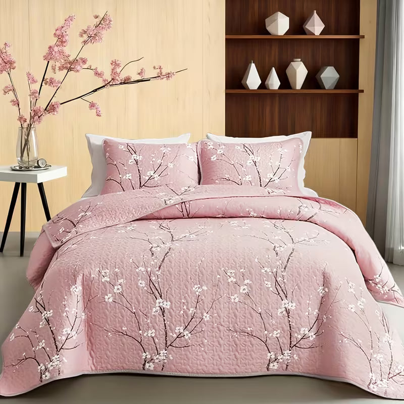 This 3-piece multi-colored quilted comforter set features tree branches and plum blossoms, including one quilted comforter and half a pillowcase. It is soft, breathable, and comfortable.